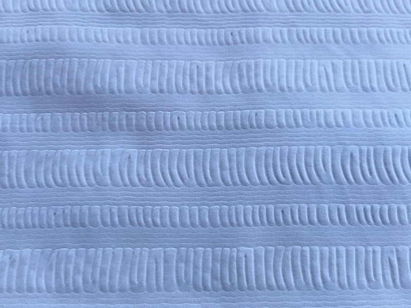 100% POLYESTER EMBOSSED FABRIC