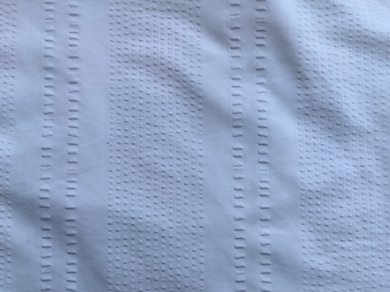 100% POLYESTER EMBOSSED FABRIC
